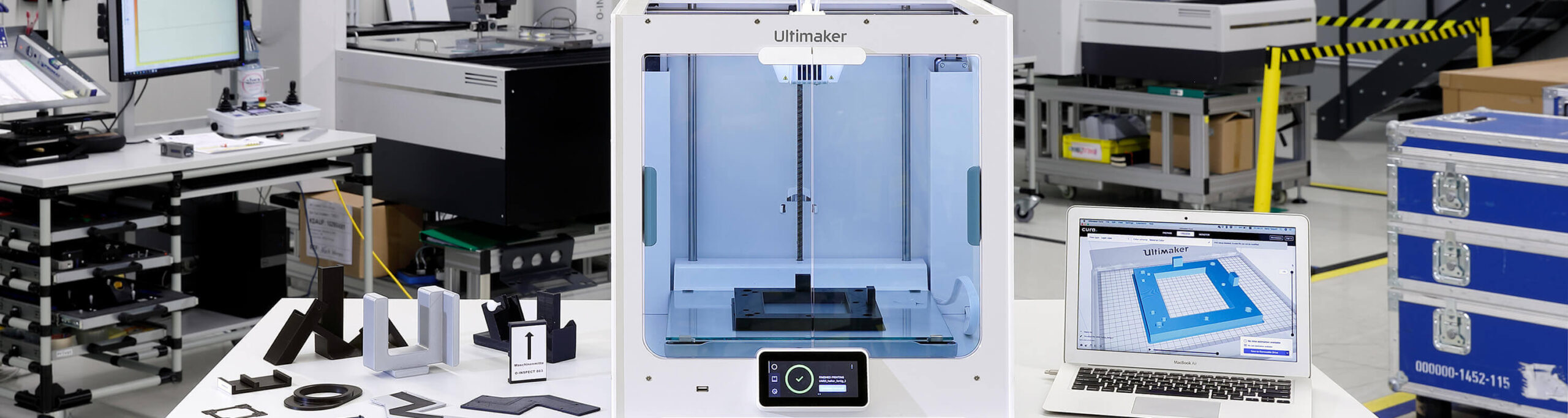 A 3D printer with software and parts printed in several materials